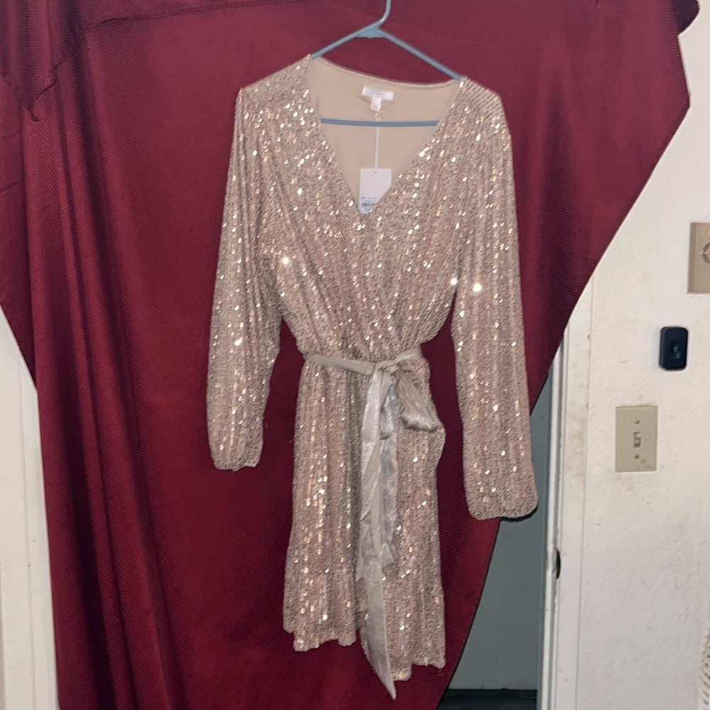 Gold sparkly Lauren Conrad wrap midi dress ruffed and layered on the bottom.
